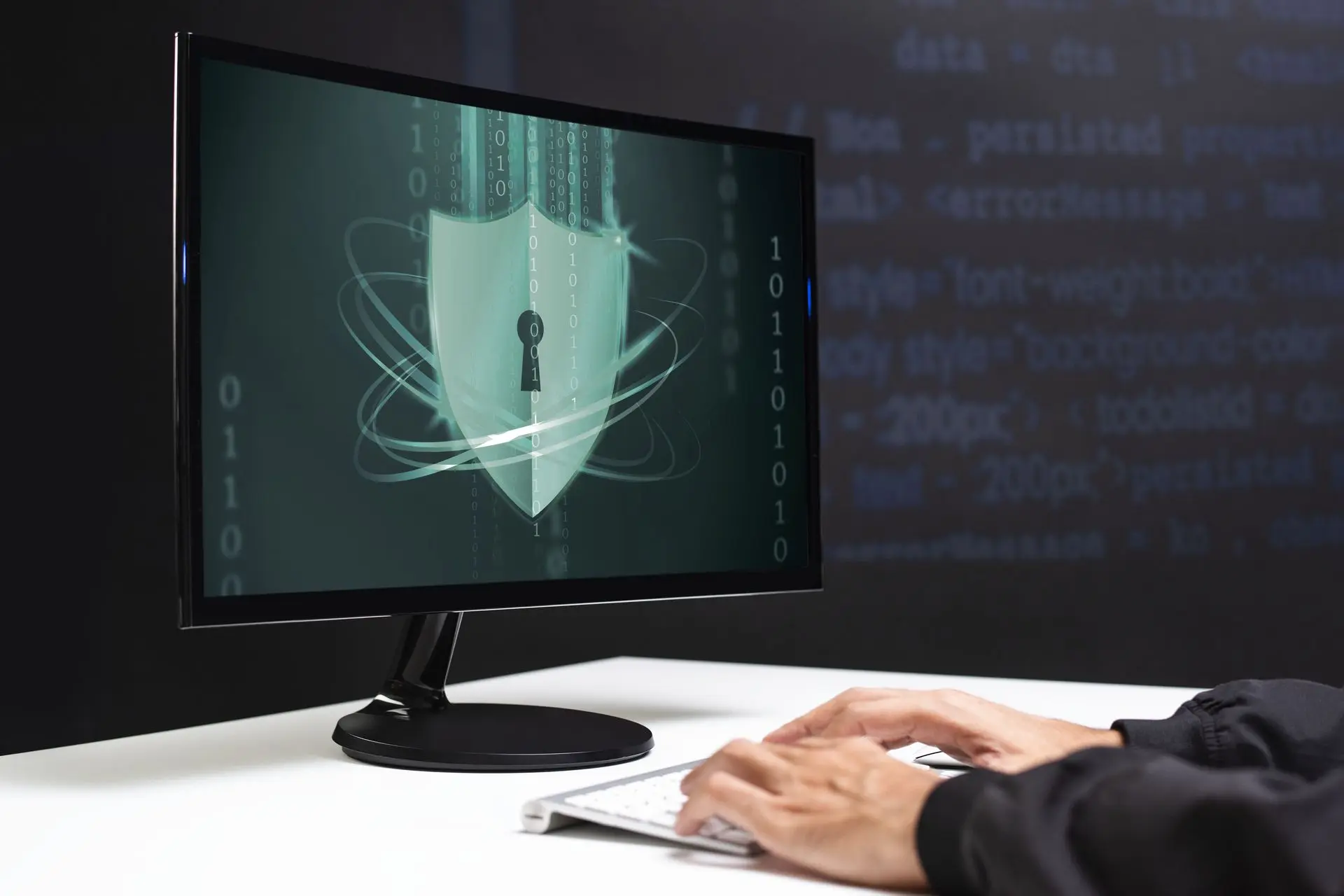 Protection des postes de travail en entreprise – écran affichant un bouclier numérique verrouillé, illustrant la cybersécurité et la sécurisation des données professionnelles.
